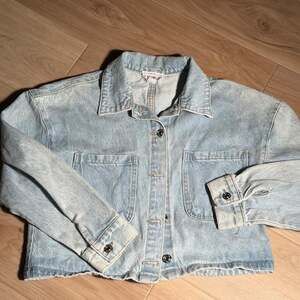 For The Republic Women’s light blue denim jacket in size Medium